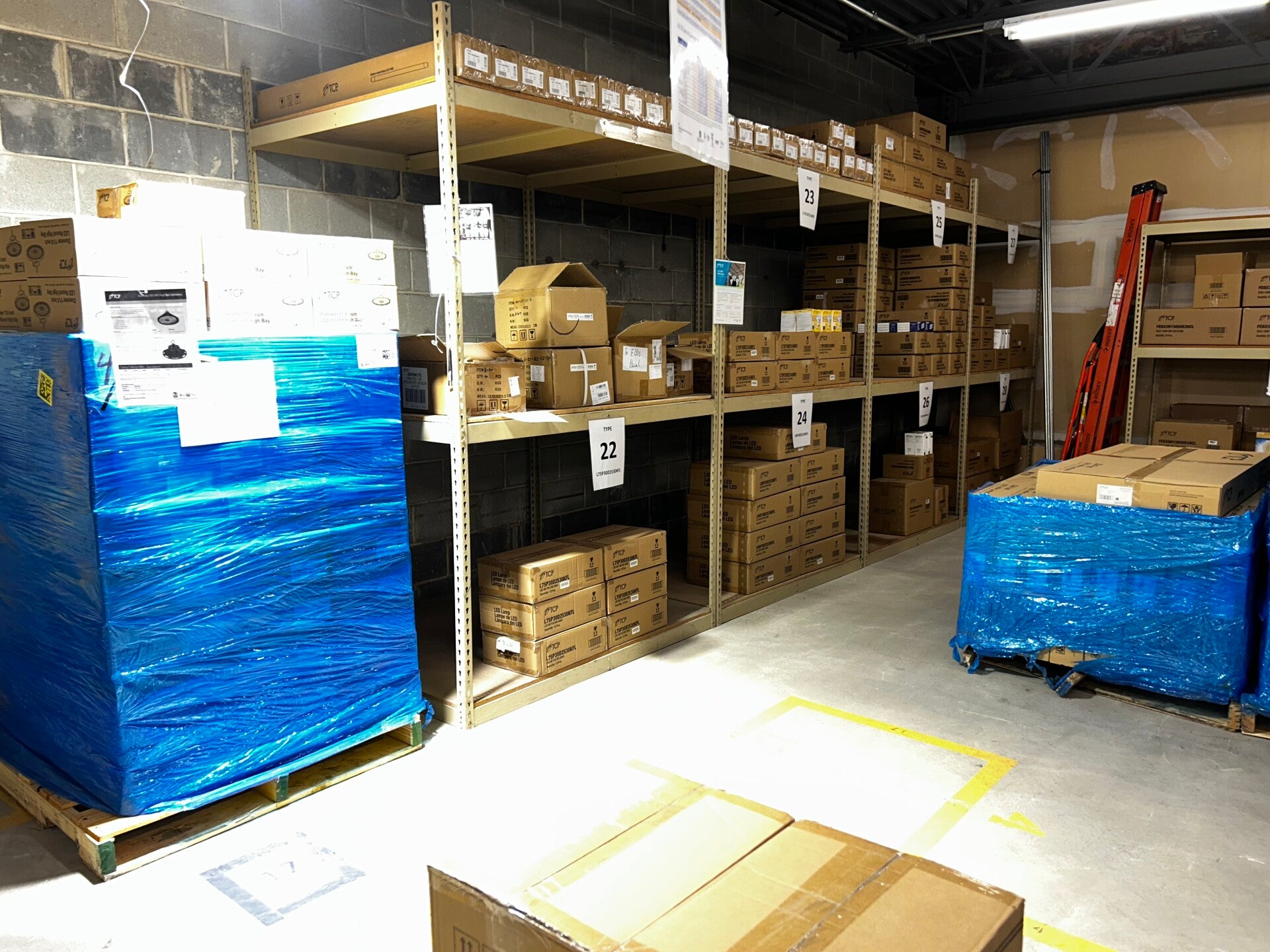 Aisle view of the All Electric Sales Addison warehouse